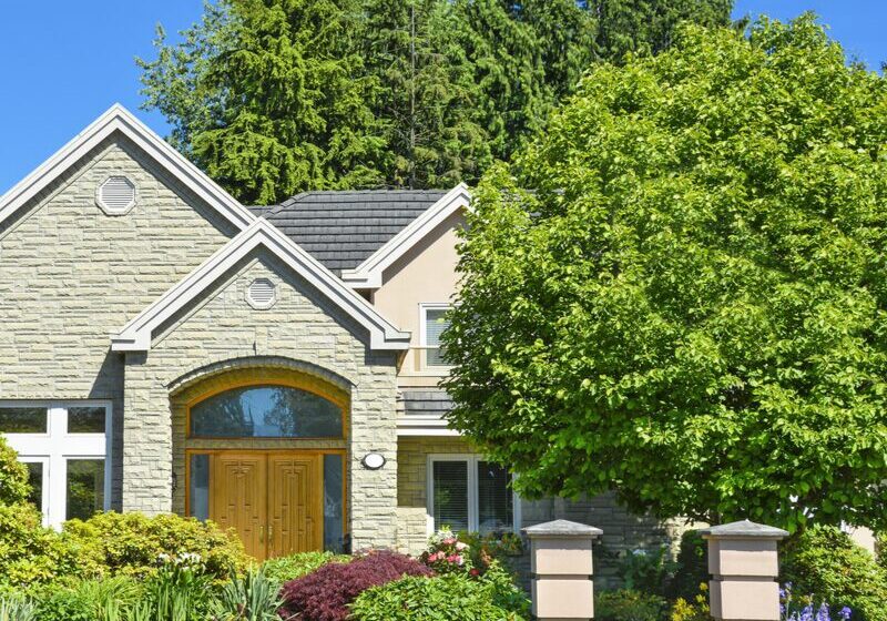Elegant home exterior with blue sky
